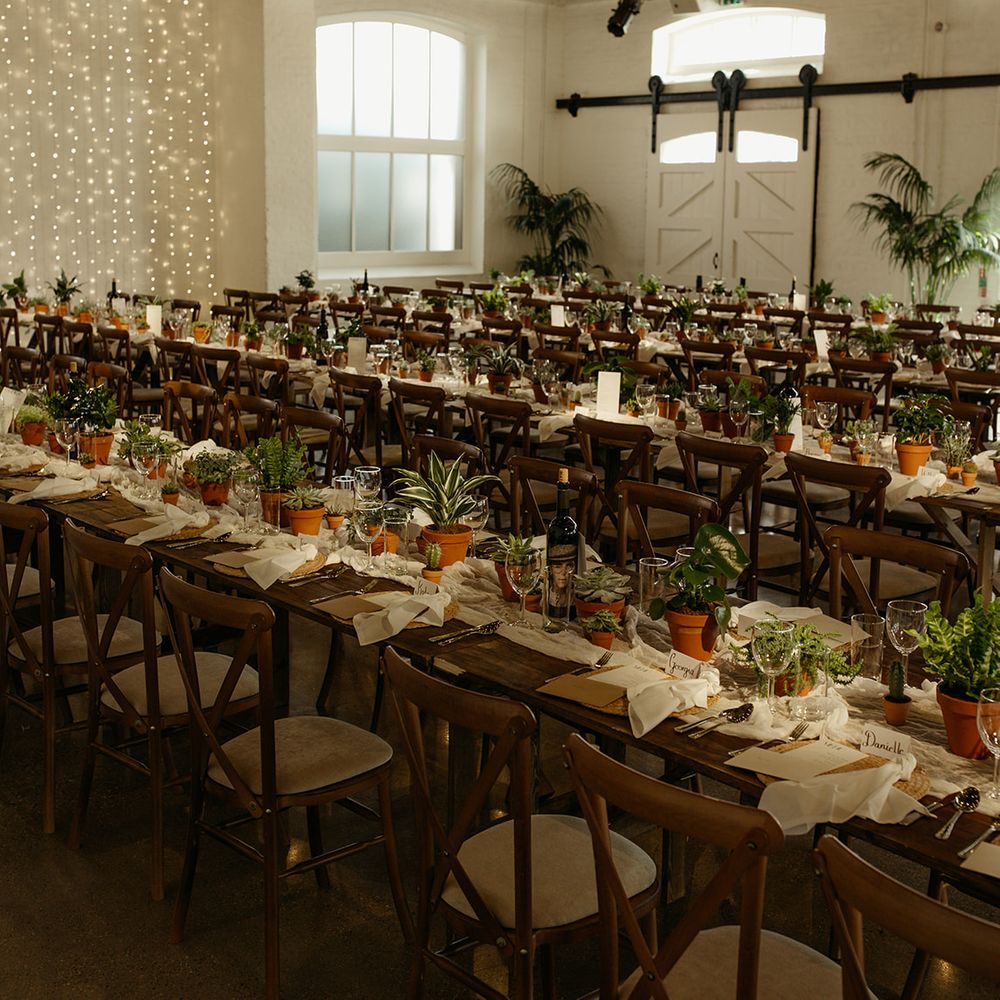 trinity-buoy-wharf-wedding-venue-with-house-plant-table-decorations