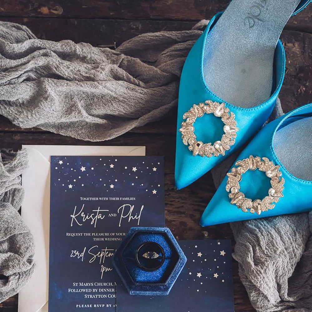 deep blue wedding accessories, including shoes and ring
