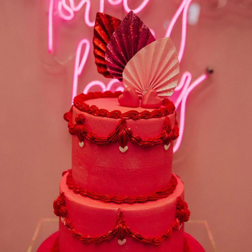 bright red and hot pink tiered wedding cake