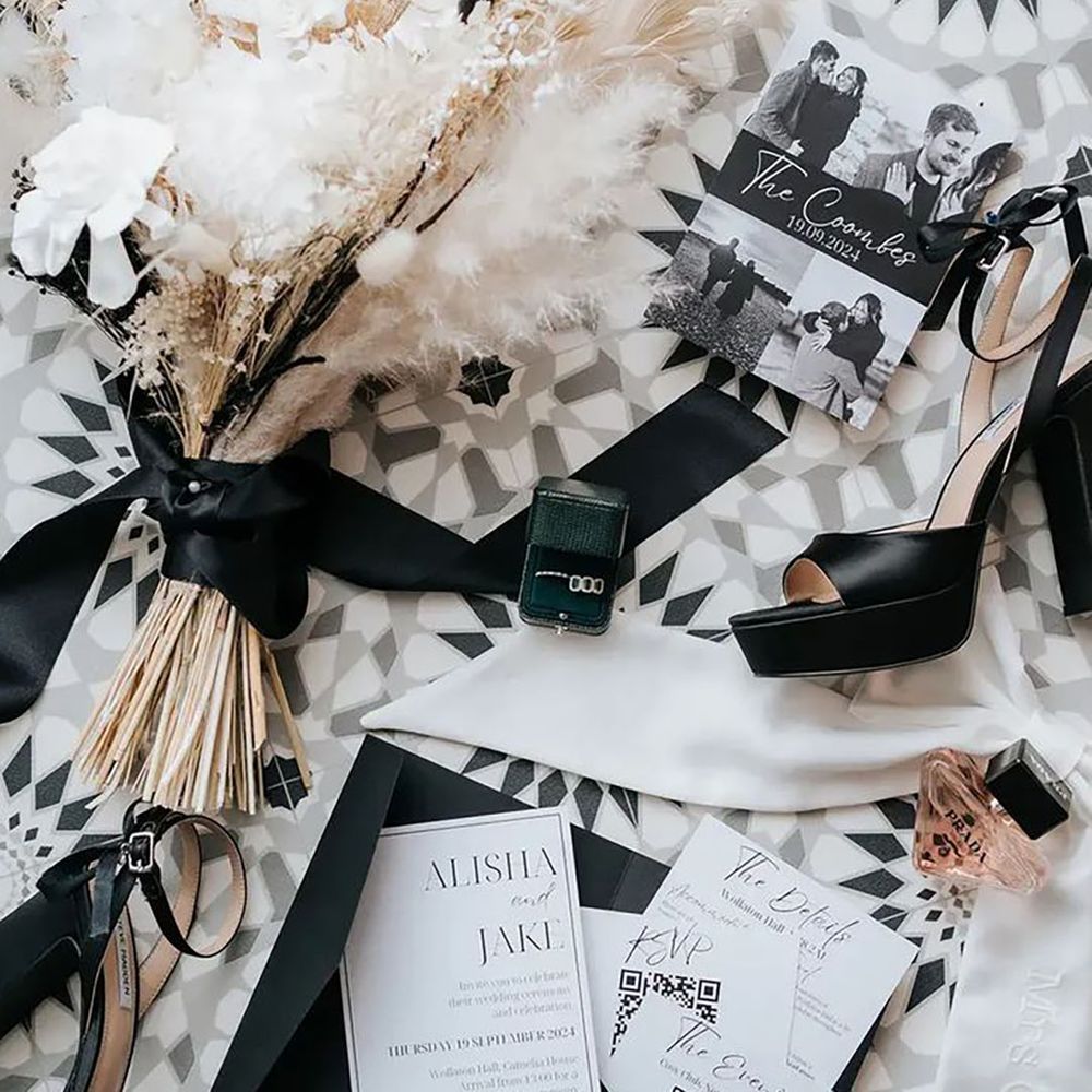 monochrome wedding theme accessories for bride, including heels and perfume