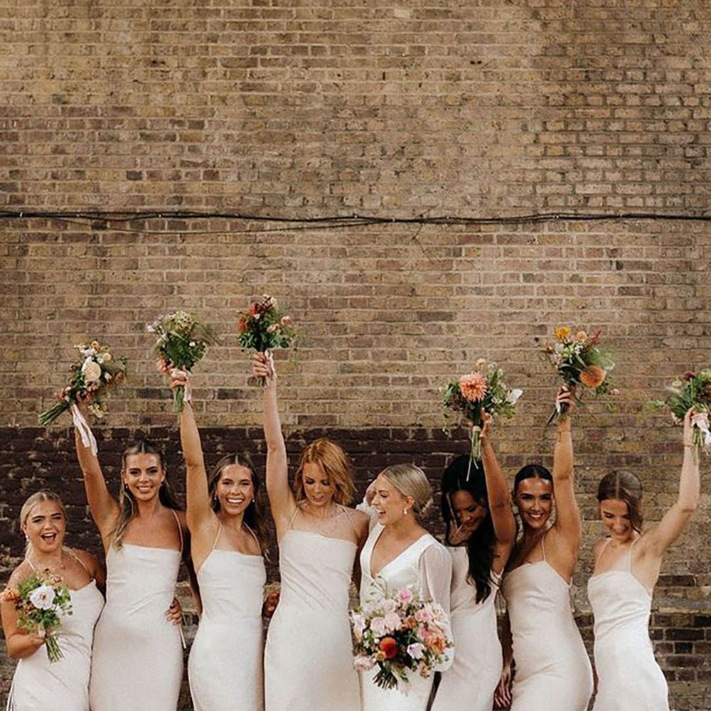 bridesmaids wearing neutral dresses