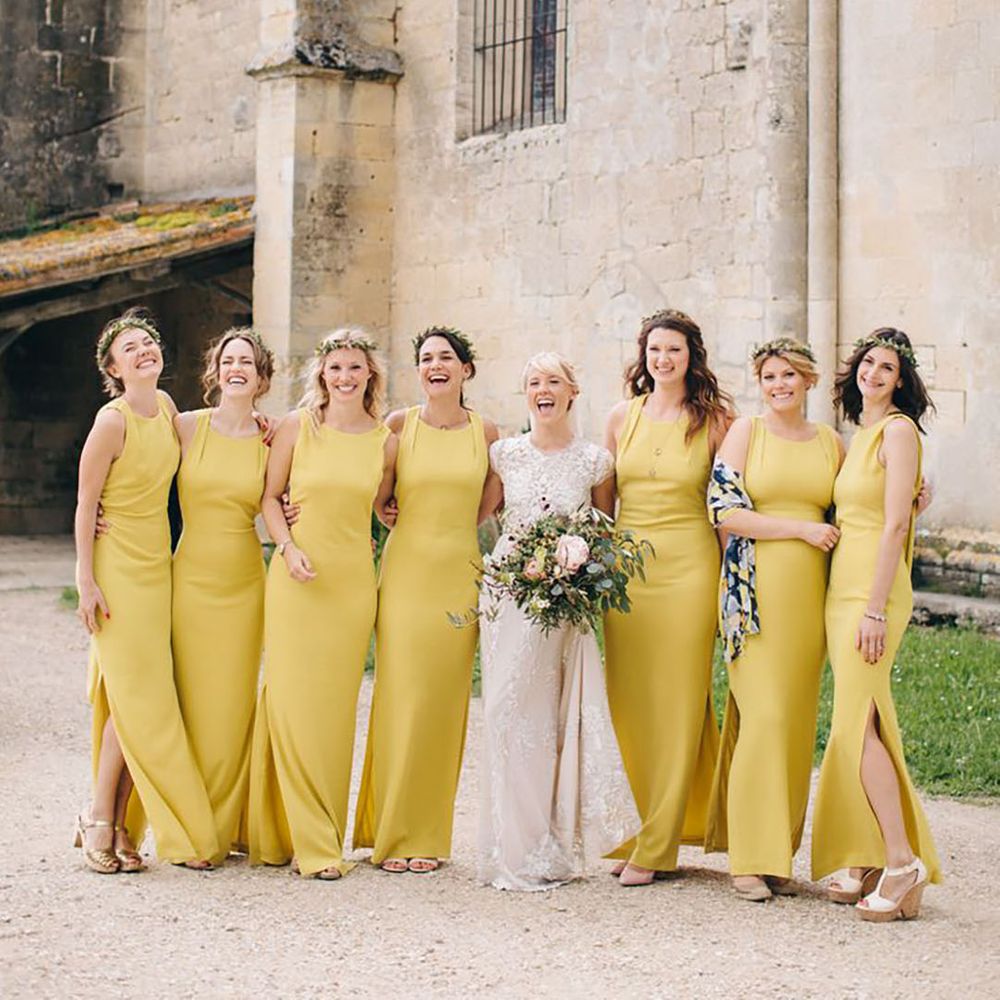 bridesmaids wearing sunflower yellow bridesmaid dresses