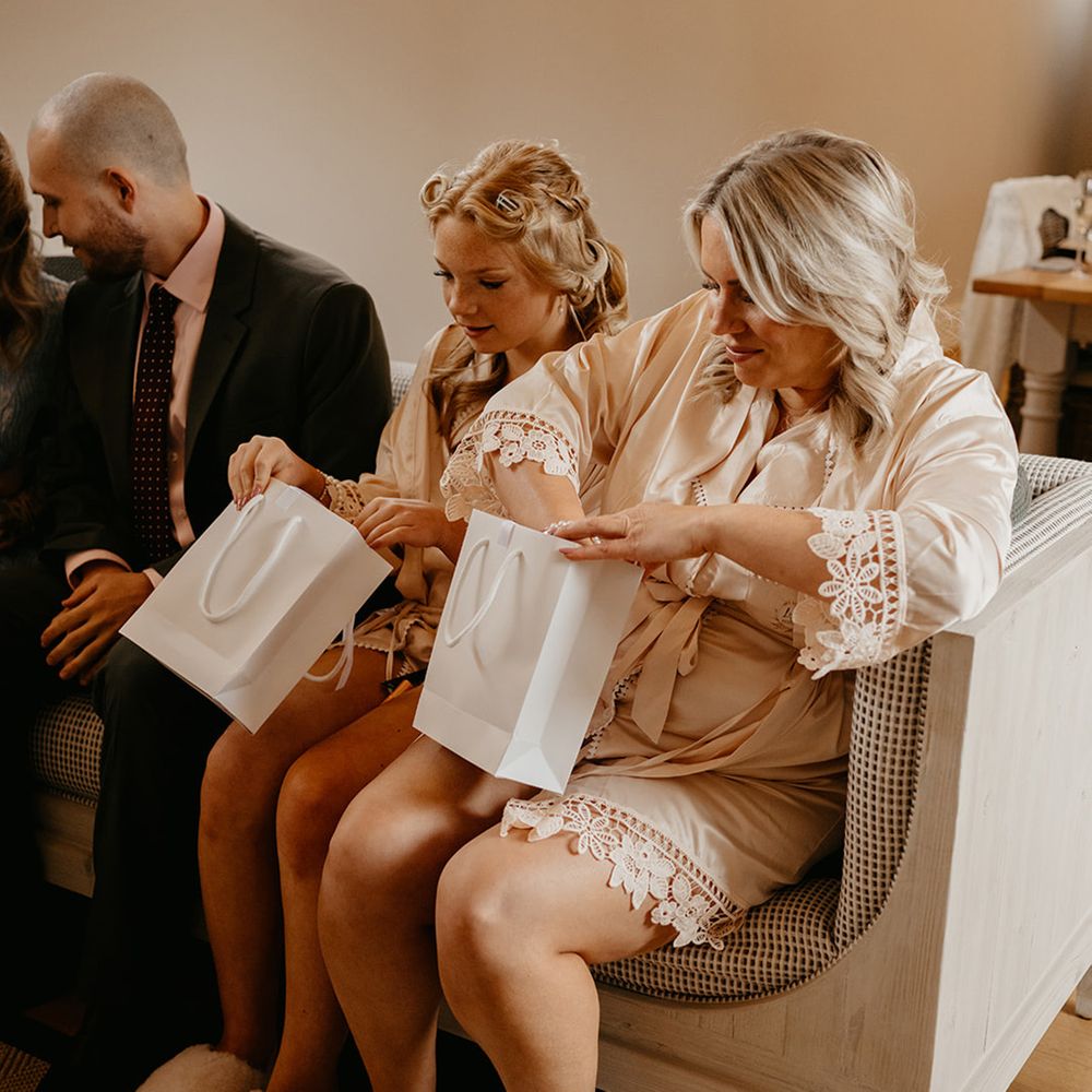 bridesmaids-opening-presents-for-wedding