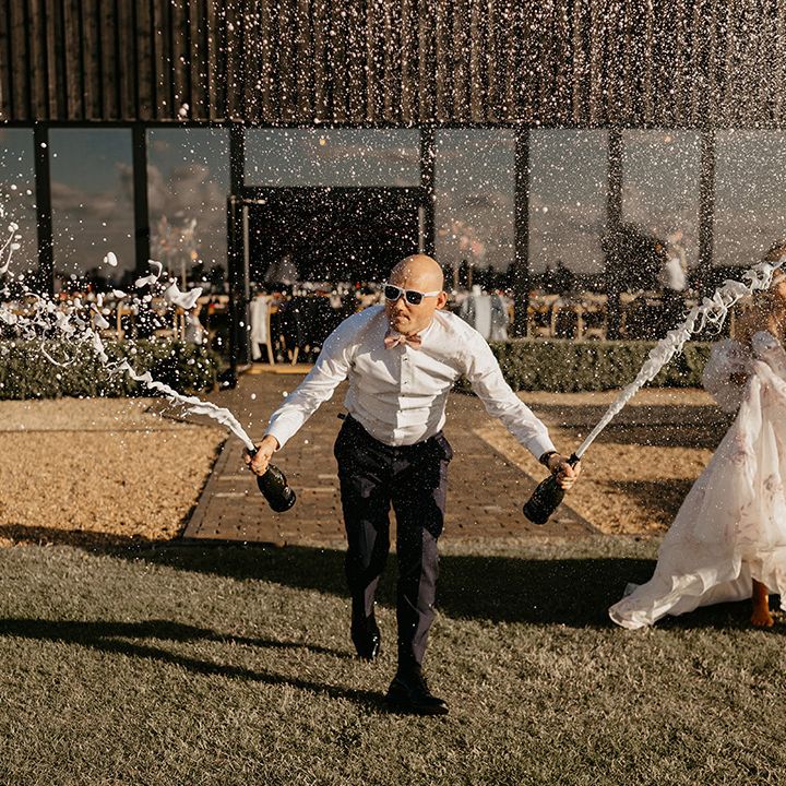 champagne-spray-at-primrose-hill-farm-wedding