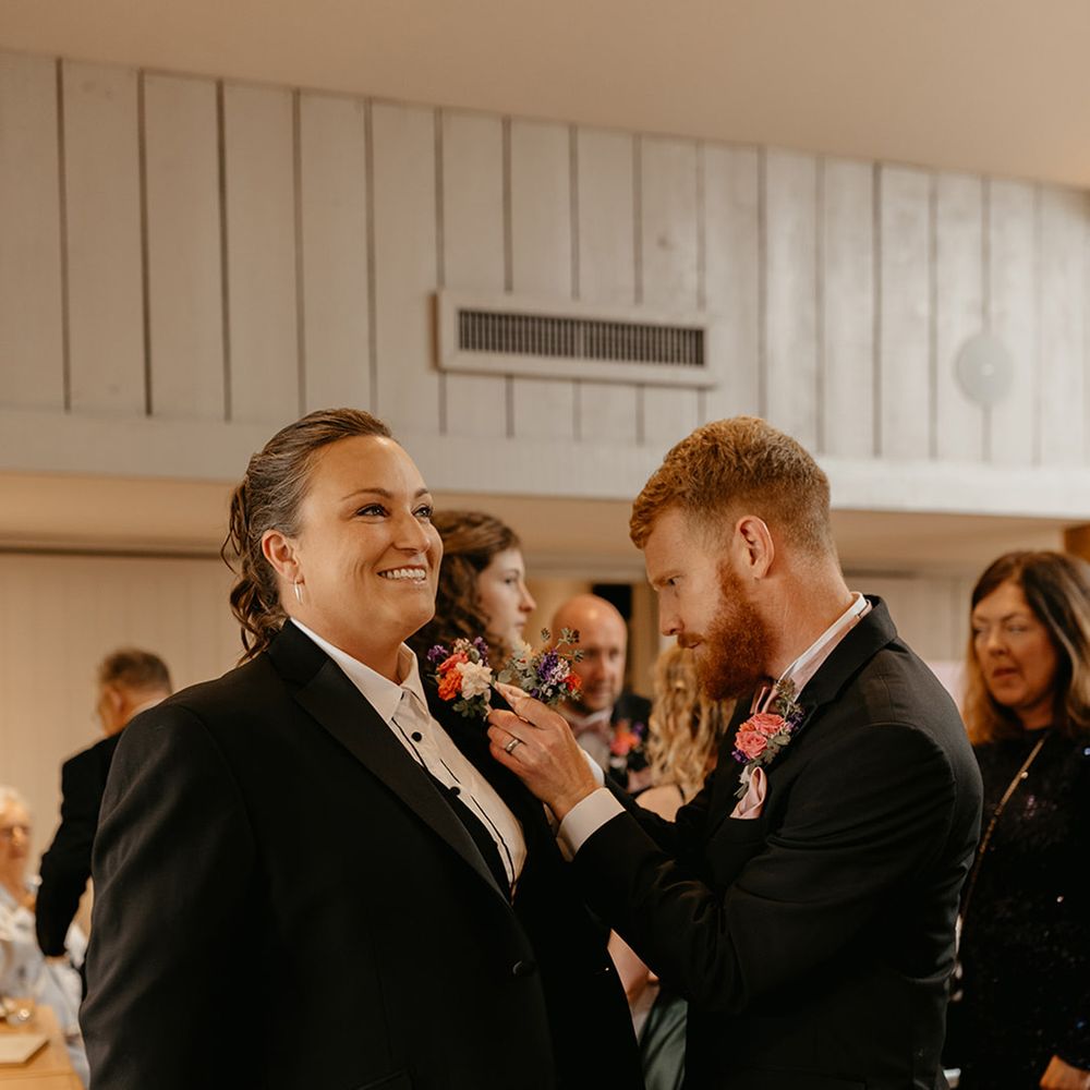 groomswomen-at-wedding-in-suits