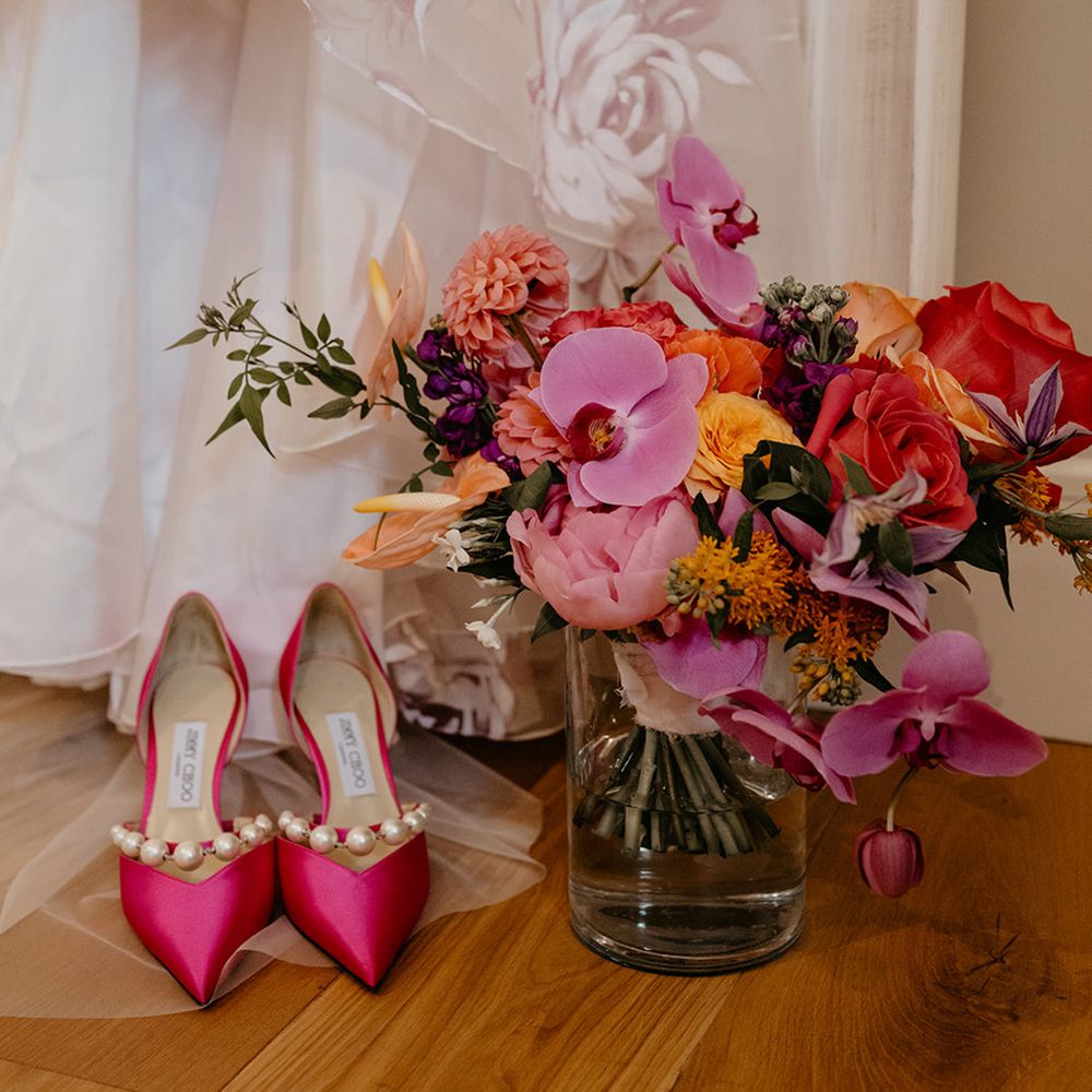 pink-jimmy-choo-wedding-shoes-with-colourful-wedding-bouquet