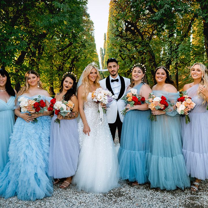 bridal-party-wearing-blue-bridedmaid-dresses