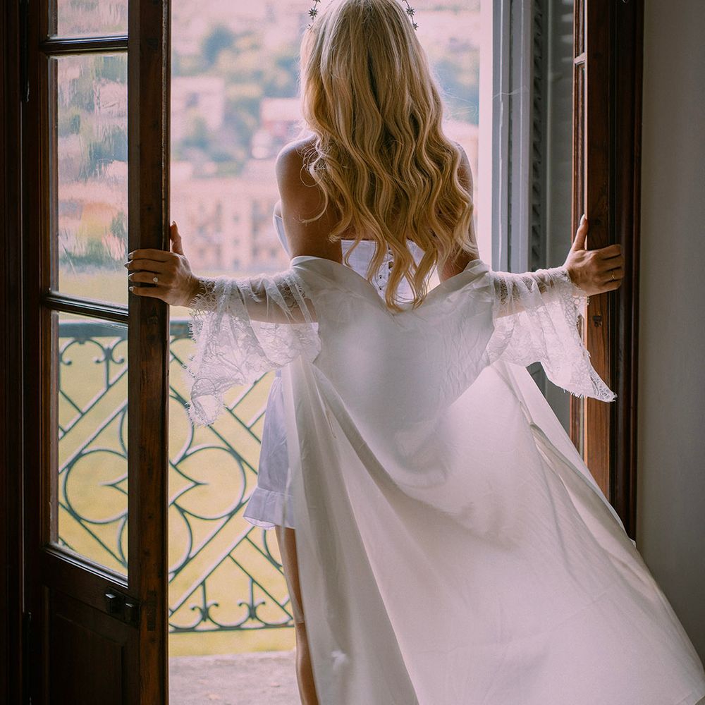 bride-wearing-bridal-crown-and-robe