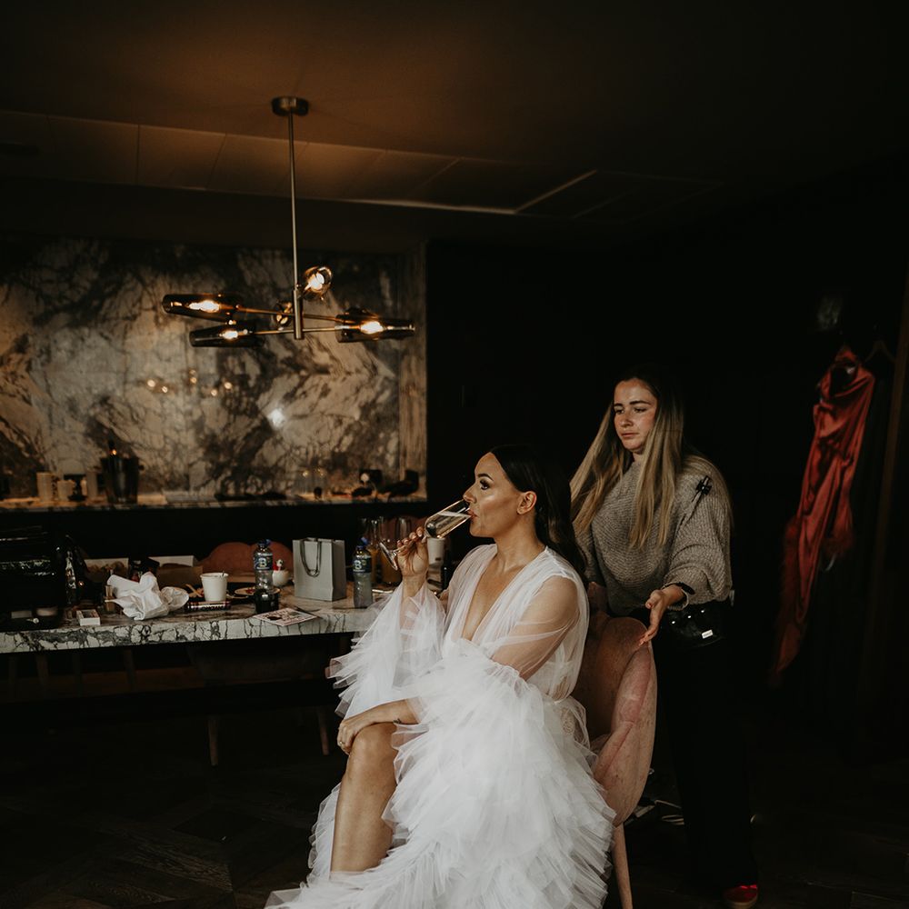 bride-in-tulle-luxe-robe-getting-ready-for-wedding
