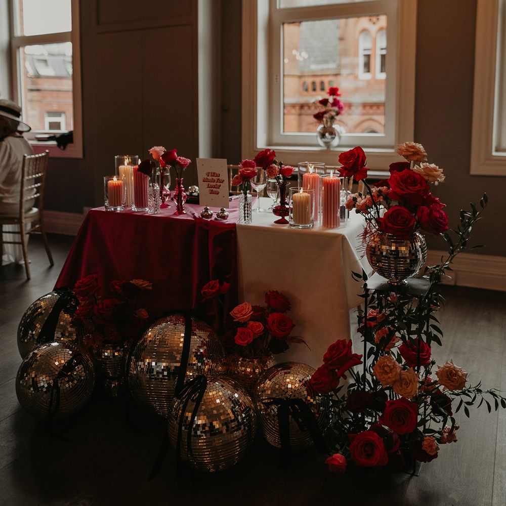 sweetheart-wedding-table-with-pink-decor-and-disco-balls