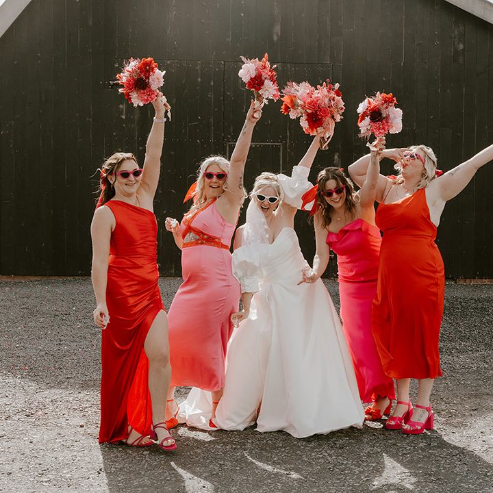 bridal-party-in-pink-and-red-bridesmaid-dresses