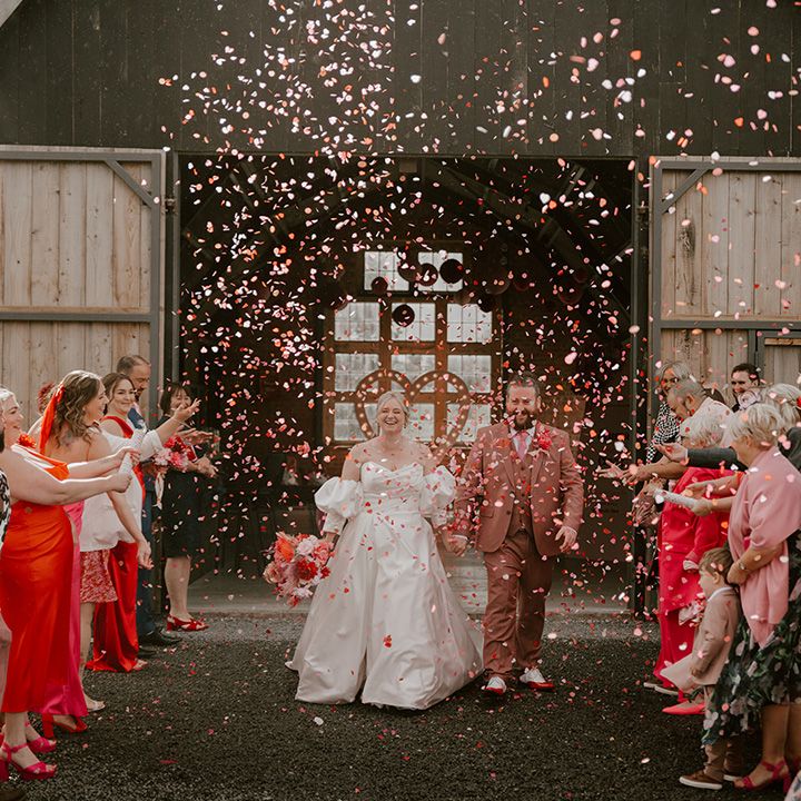confetti-moment-at-industrial-wedding-venue