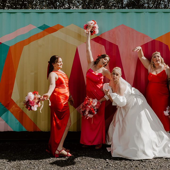 mismatched-pink-and-orange-bridesmaid-dresses