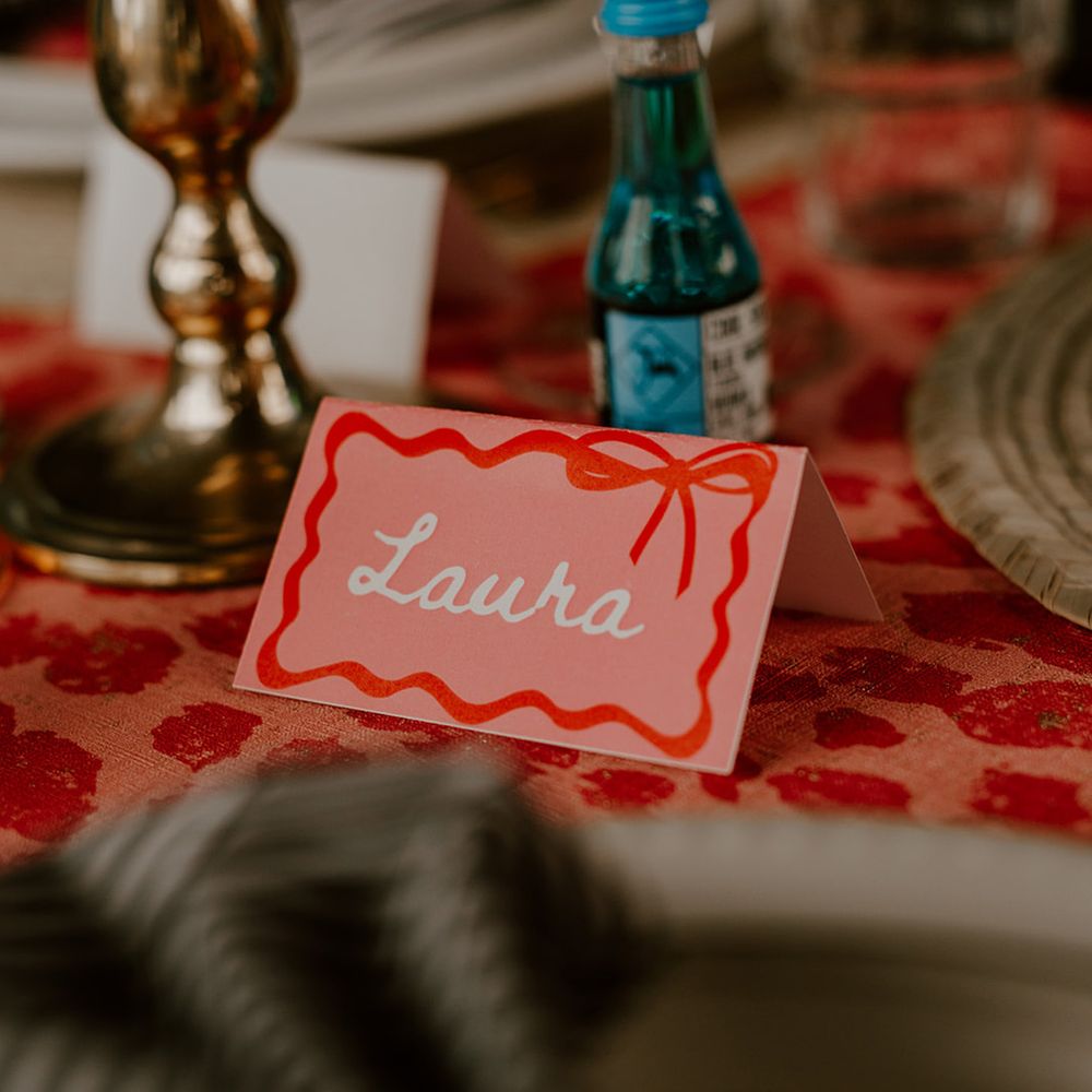 pink-and-red-bow-wedding-place-name-cards