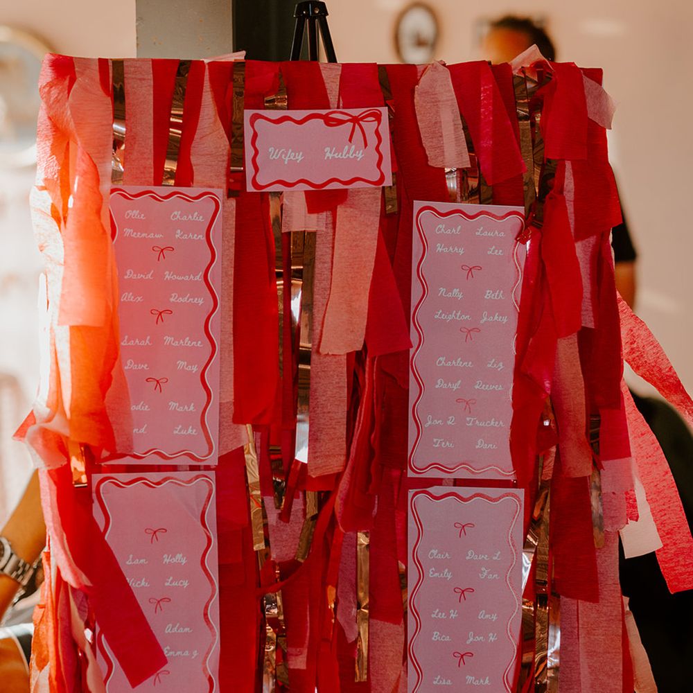 pink-and-red-wedding-streamer-wedding-seating-chart