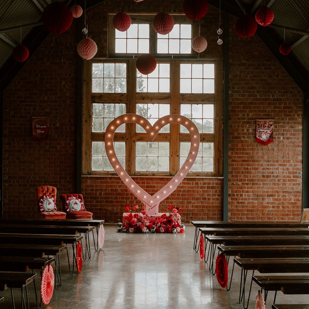 pink-light-up-heart-altar-decoration-with-colourful-paper-lanterns