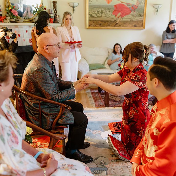 bride-and-father-of-the-bride-hold-hands