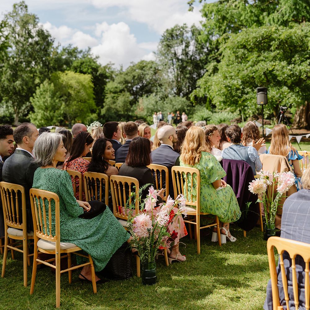 wedding-guests-seated-at-outdoor-wedding-ceremony