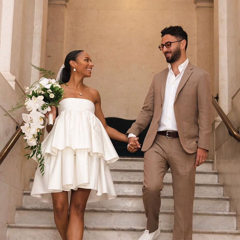 bride wearing rotate birger chirstensen rented wedding dress