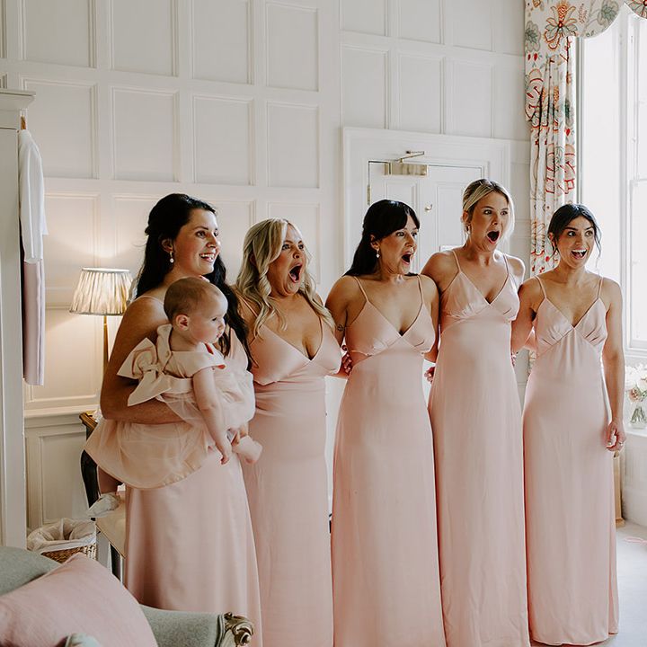 bridal-party-with-bridesmaids-in-pink-satin-bridesmaid-dresses