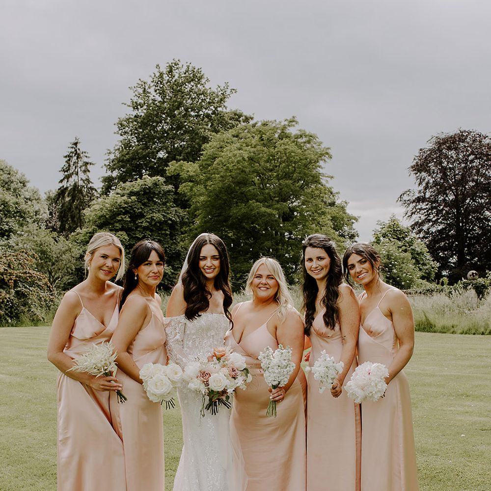 bride-and-bridesmaids-with-pink-satin-dresses