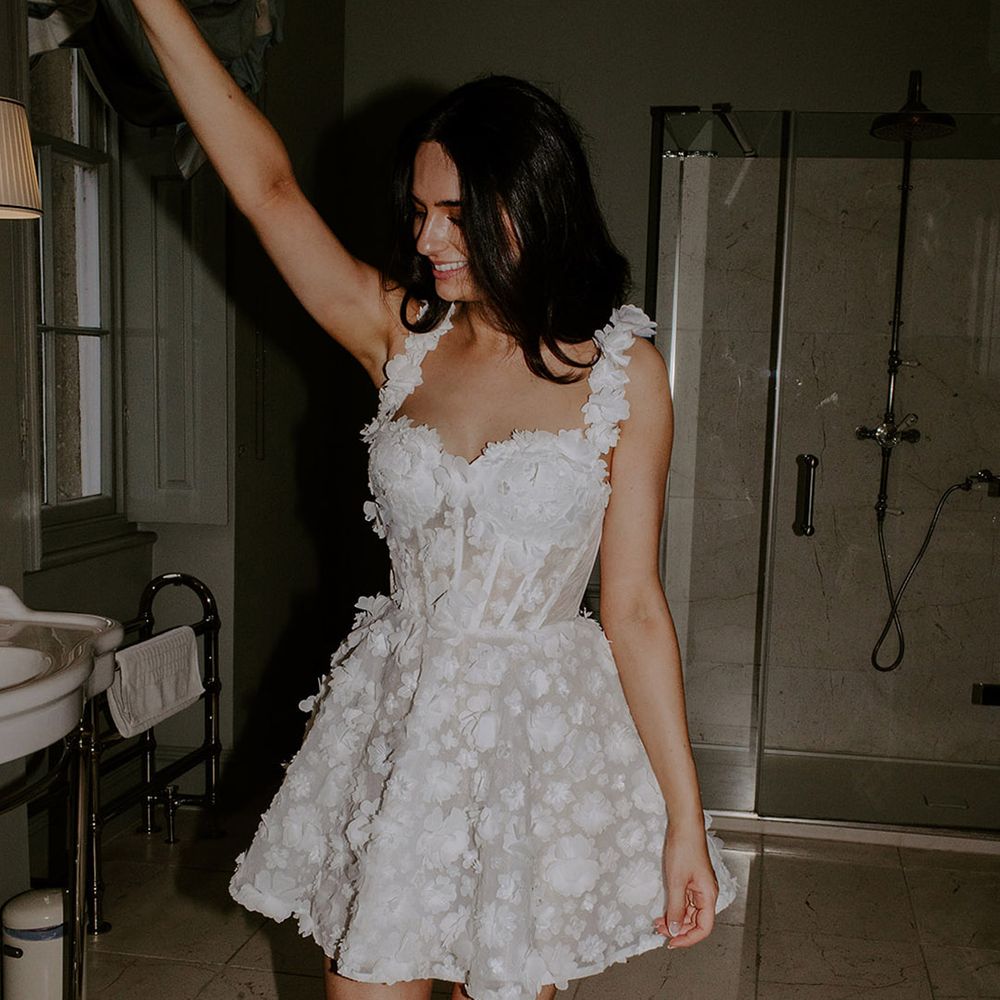 bride-in-white-flower-wedding-reception-dress