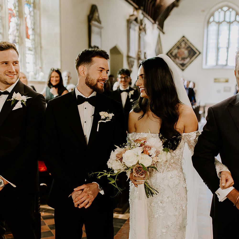 hurch-wedding-ceremony-with-bride-and-groom-gazing-at-each-other.