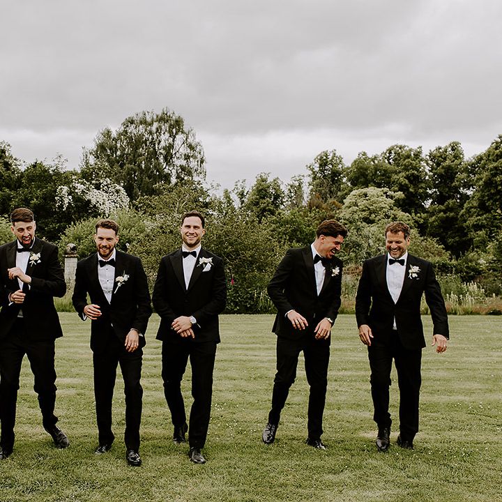 groom-and-groomsmen-in-black-tuxedo