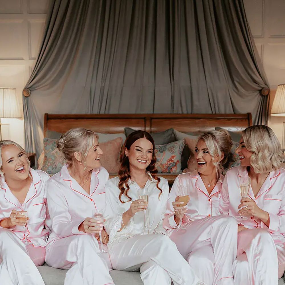 pink-satin-pyjamas-for-bridesmaids-at-elmore-court-wedding