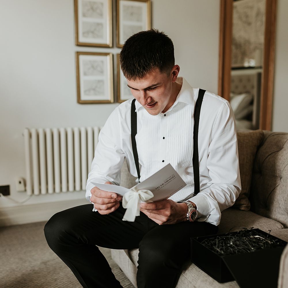 groom-reads-letter-from-bride