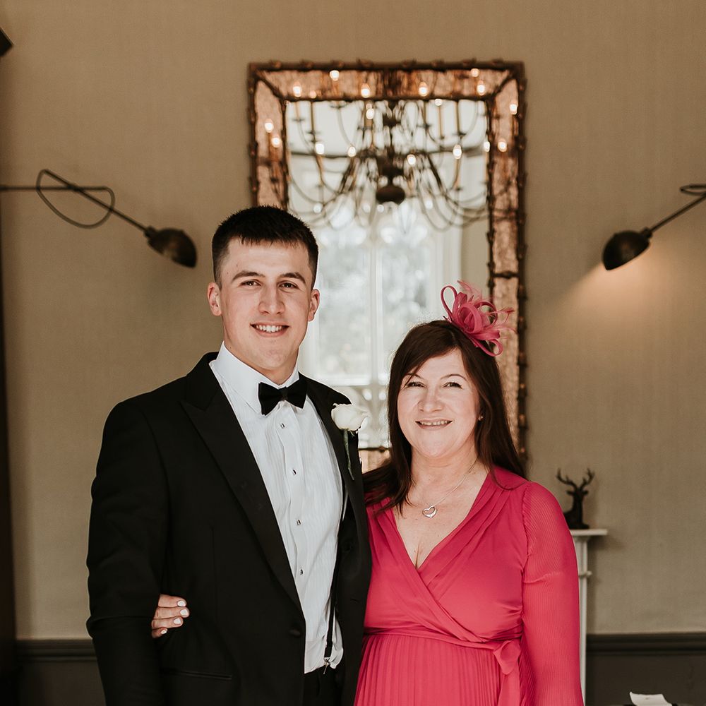 groom-with-mother-of-the-groom-in-pink-dress