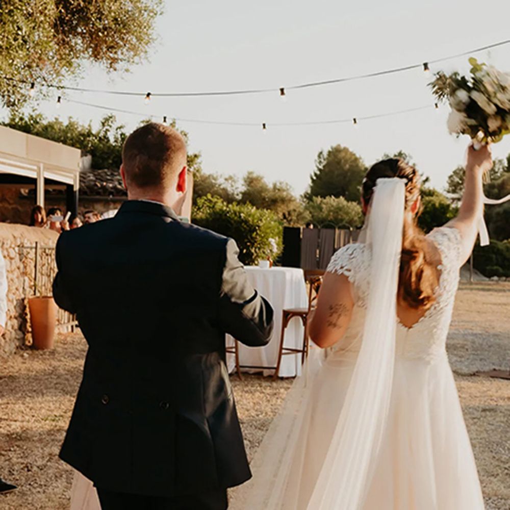 couple-enters-wedding-breakfast