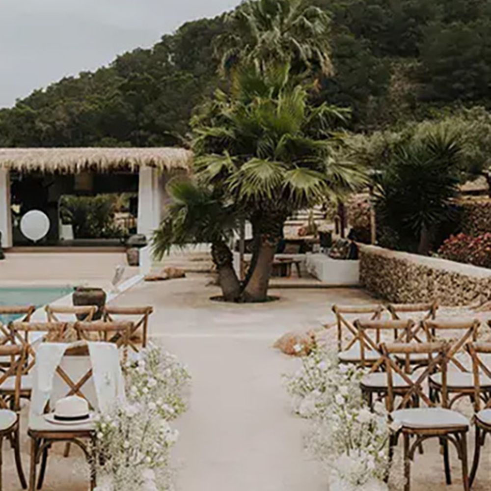 poolside-wedding-ceremony-at-pure-house-ibiza-with-giant-white-balloons-and-white-aisle-flowers
