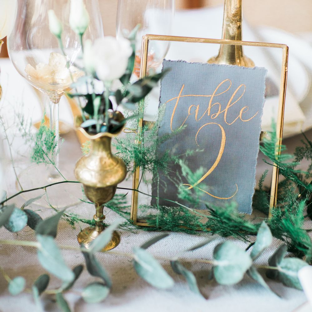 Elegant Place Setting With Gold Cutlery & Foliage Table Runner