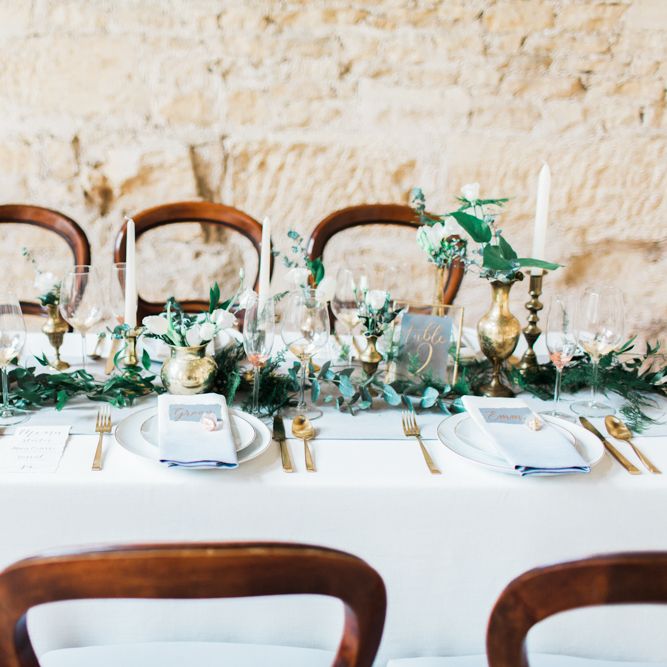 Elegant Place Setting With Gold Cutlery & Foliage Table Runner