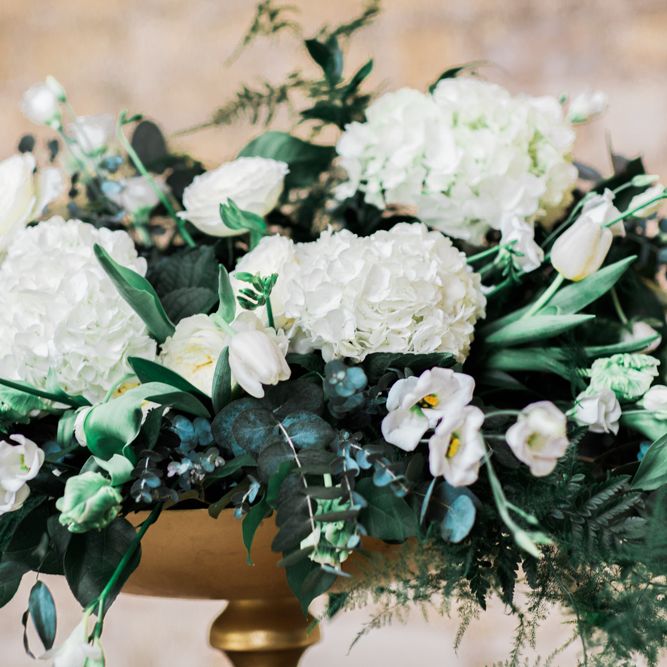White Floral Display With Lots Of Foliage