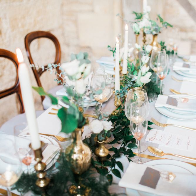 Elegant Place Setting With Gold Cutlery & Foliage Table Runner