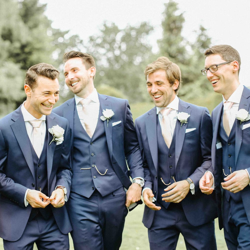 Groom in Navy Charles Tyrwhitt Suit