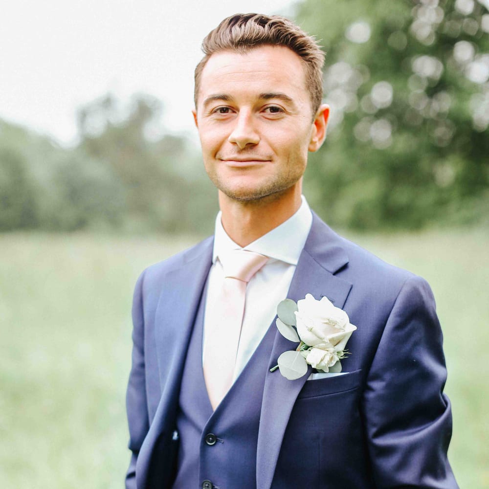 Groom in Navy Charles Tyrwhitt Suit