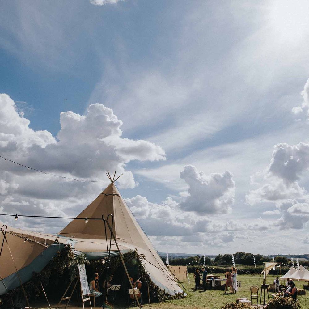 Abbi From Save The Date Magazine Gets Married Wearing Margaux Taridts & Grace Loves Lace Outdoor Festival Wedding With Tipis, Bell Tent Camping & Festoon Lights