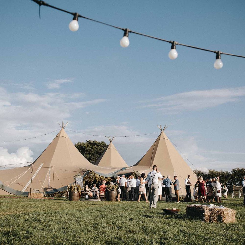 Abbi From Save The Date Magazine Gets Married Wearing Margaux Taridts & Grace Loves Lace Outdoor Festival Wedding With Tipis, Bell Tent Camping & Festoon Lights