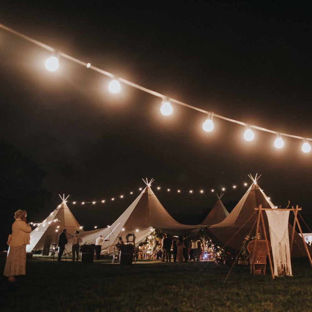 Abbi From Save The Date Magazine Gets Married Wearing Margaux Taridts & Grace Loves Lace Outdoor Festival Wedding With Tipis, Bell Tent Camping & Festoon Lights