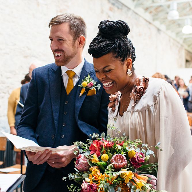 Wedding Ceremony | Bride in Bespoke Ailsa Monroe Jumpsuit & Cape | Groom in Next Navy Wool Suit | Relaxed Industrial Wedding at Ocean Studios, Plymouth | Freckle Photography