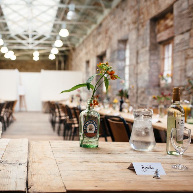 Trestle Table Scape | | Relaxed Industrial Wedding at Ocean Studios, Plymouth | Freckle Photography