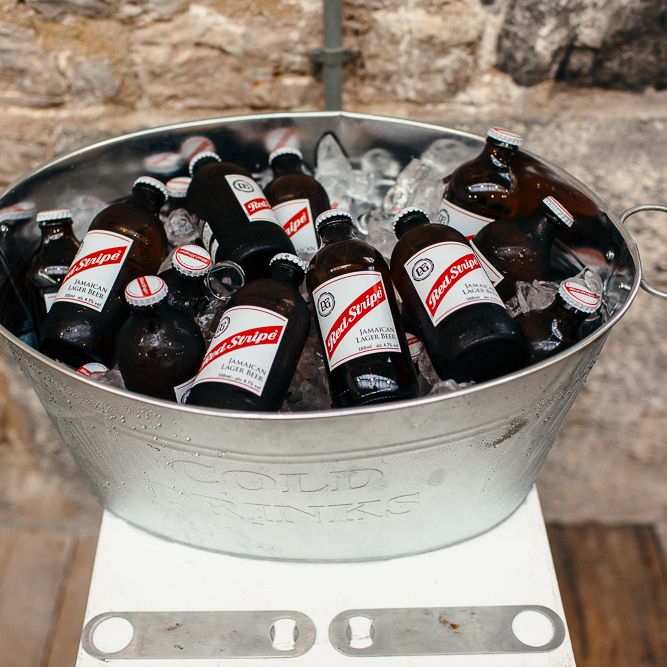 Beer Bottles in Tub | | Relaxed Industrial Wedding at Ocean Studios, Plymouth | Freckle Photography