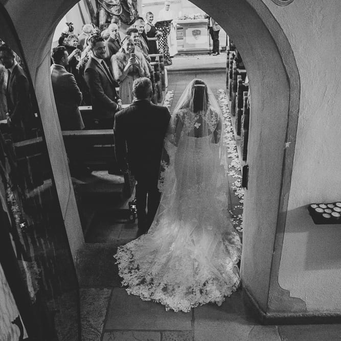 Bride in Ian Stuart Wedding Dress Wedding Ceremony Entrance