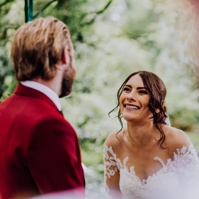 Outdoor Wedding Ceremony | Bride in Rosa Clara Naim Bridal Gown | Groom in Bespoke Burgundy Suit | Stylish Woodland Wedding in Cheshire | Clara Cooper Photography | Story Board Weddings Films