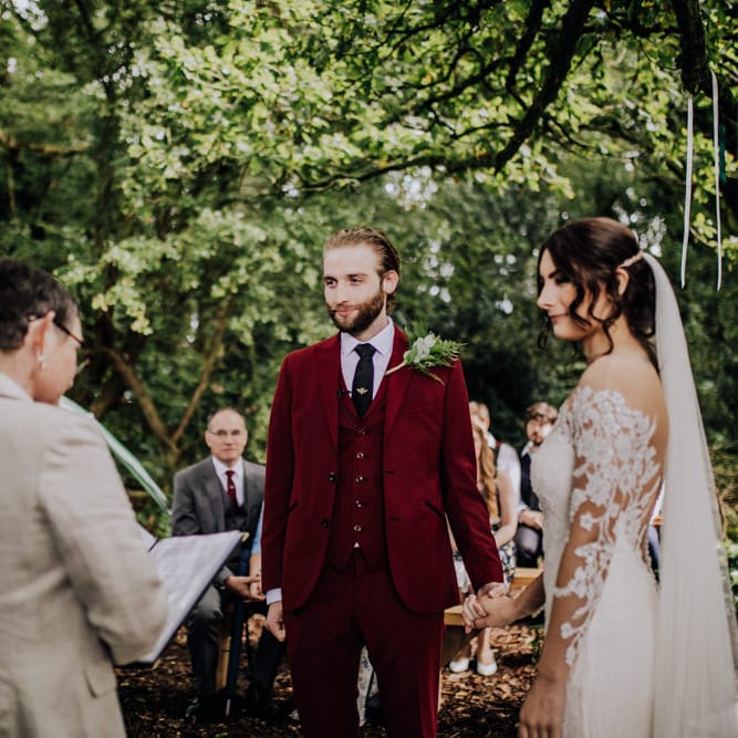 Outdoor Wedding Ceremony | Bride in Rosa Clara Naim Bridal Gown | Groom in Bespoke Burgundy Suit | Stylish Woodland Wedding in Cheshire | Clara Cooper Photography | Story Board Weddings Films