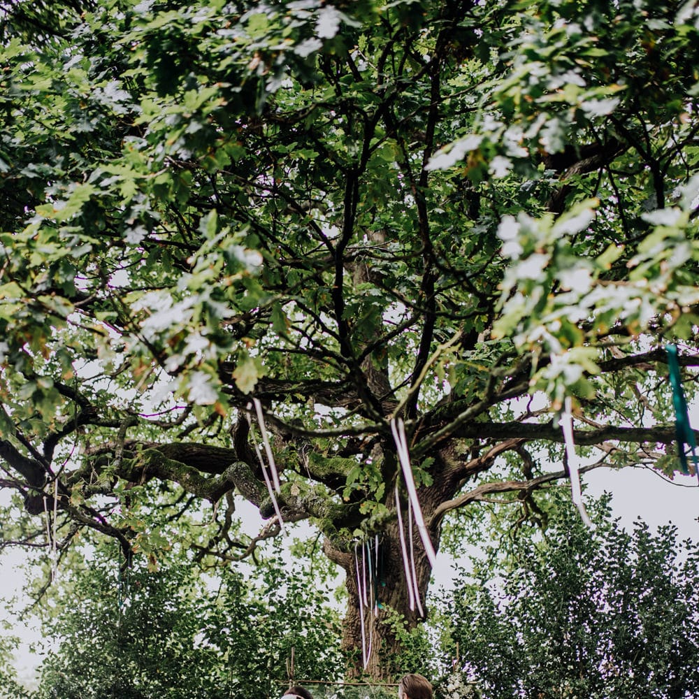 Outdoor Wedding Ceremony | Bride in Rosa Clara Naim Bridal Gown | Groom in Bespoke Burgundy Suit | Stylish Woodland Wedding in Cheshire | Clara Cooper Photography | Story Board Weddings Films