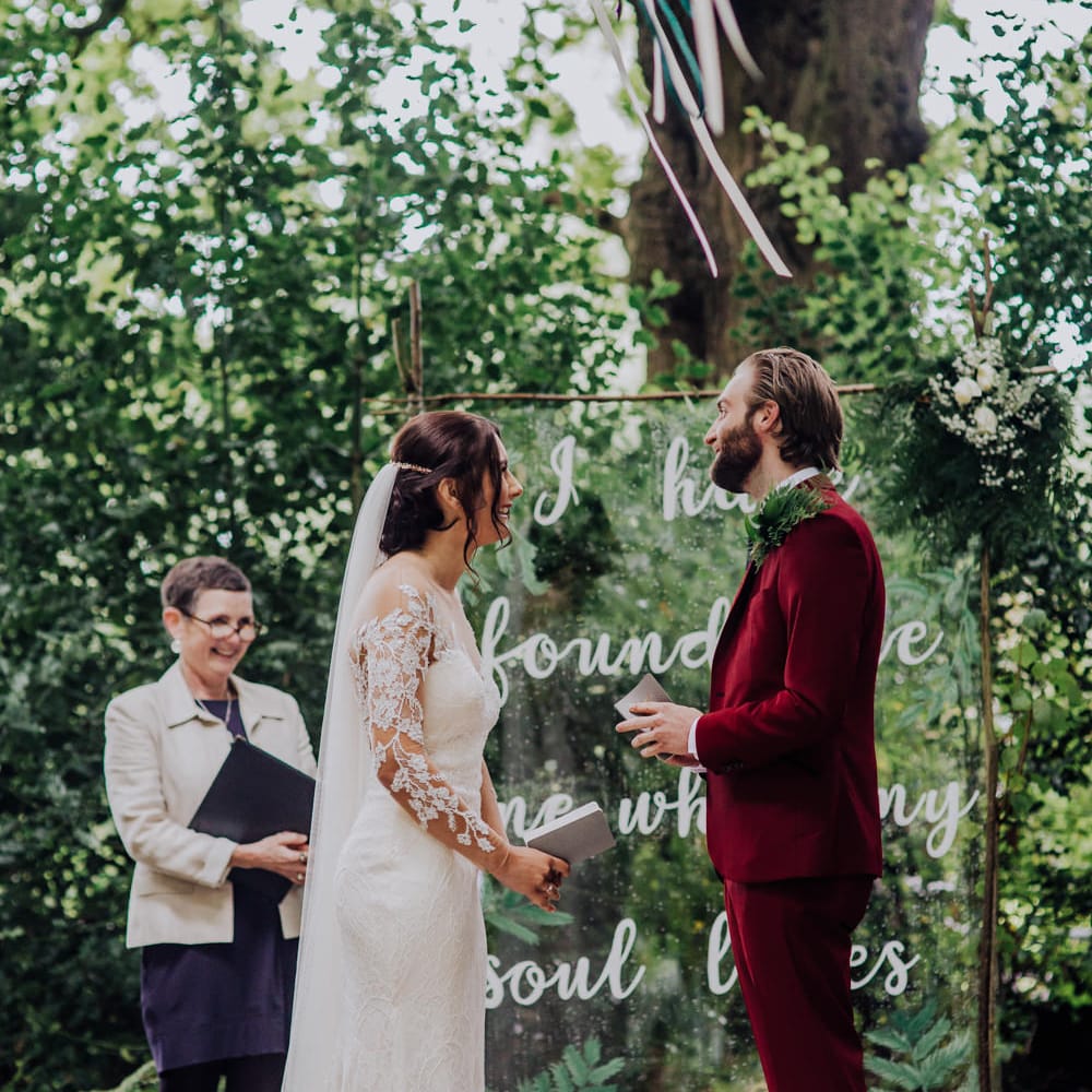 Outdoor Wedding Ceremony | Bride in Rosa Clara Naim Bridal Gown | Groom in Bespoke Burgundy Suit | Stylish Woodland Wedding in Cheshire | Clara Cooper Photography | Story Board Weddings Films
